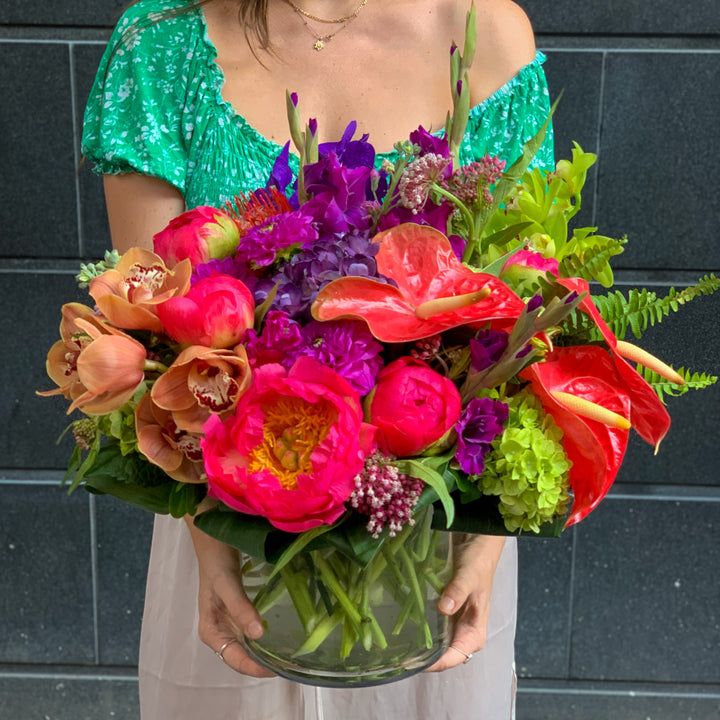 orchids, anthirium, Dahlia, Peony, Stock, Snap Dragon, and Gladiolus